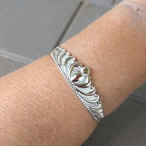 Women's two tone copper crown cuff bracelet.